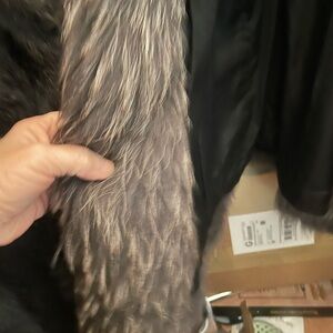 Beautiful raccoon coat, my favorite but too big for me.